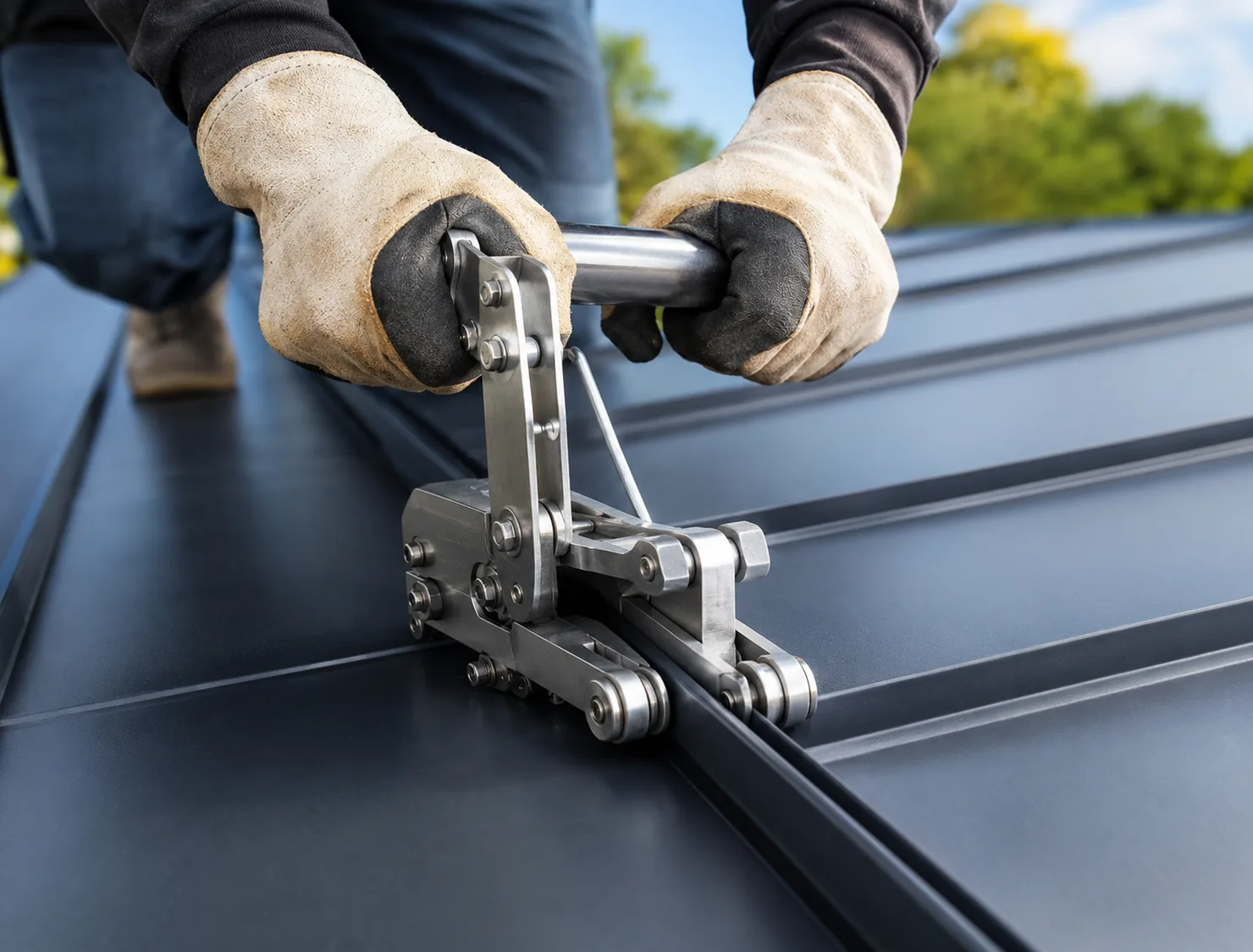 Metal roof panels being installed on Milwaukee home during full roof replacement